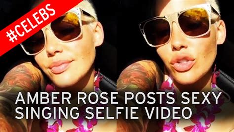 Amber Rose sends temperatures soaring as she poses TOPLESS